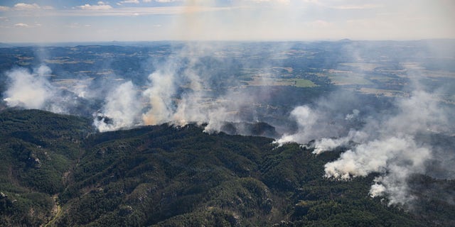 View of the fire in Germany from a helicopter. (Robert Michael/dpa via AP)