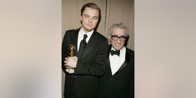 Leonardo DiCaprio and Martin Scorsese celebrated their win for Best Drama Motion Picture for "The Aviator" at a Post Golden Globe party in 2004.