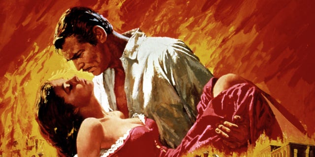 "Gone with the Wind" poster featuring Vivien Leigh and Clark Gable, 1939. The fiery collapse of Atlanta served as the climactic backdrop of the American epic. 