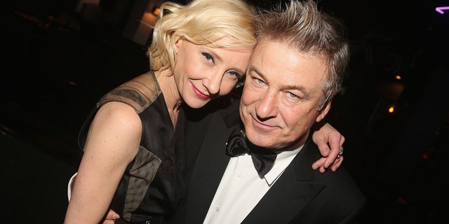 Anne Heche and Alec Baldwin pose at the after party for The Roundabout Theatre Company benefit performance of "Twentieth Century" at Patricks Restaurant and Oyster Bar Times Square in 2019