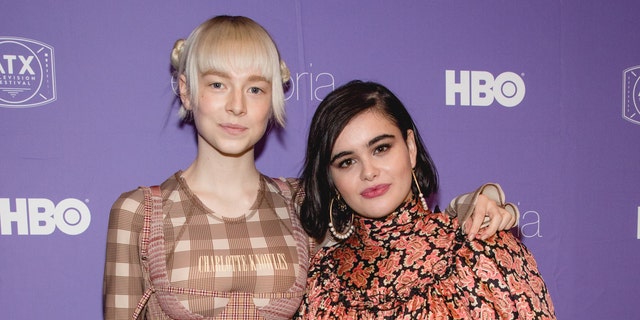 Hunter Schafer, left, expressed sadness about co-star Barbie Ferreira's departure, posting an Instagram story with a sad eye and pink heart emoji. 