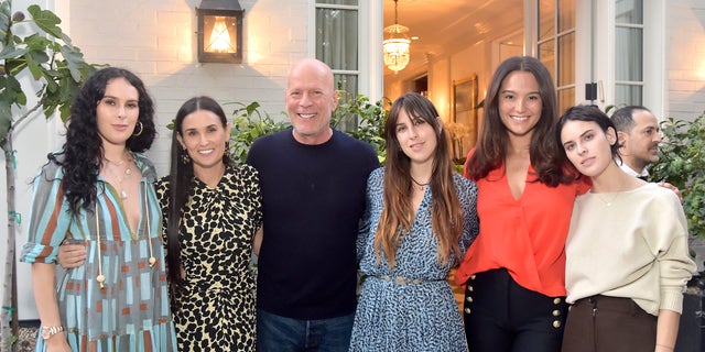 Bruce Willis and Demi Moore divorced over 20 years ago, but have remained close.  (From LR) Rumer, Demi, Bruce, Scout, Emma and Tallulah attend book party 