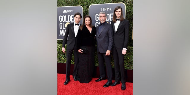 Pierce Brosnan with his wife, Keely, and sons Paris (left) and Dylan (right).