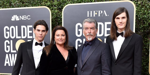 Pierce Brosnan with his wife, Keely, and sons Paris (left) and Dylan (right).