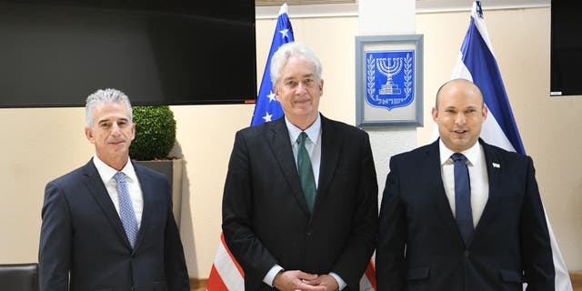 CIA director William Burns (C) meets Prime Minister of Israel, Naftali Bennett (R) at the Defense Ministry in Tel Aviv, Israel on August 11, 2021. Director of Mossad, David Barnea (L) also attended the meeting. 