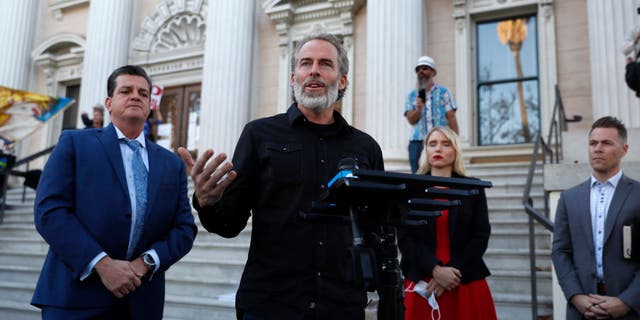 Pastor Mike McClure, from Calvary Chapel San Jose, speaks during a press conference outside of Santa Clara Superior Court in downtown San Jose, California, Dec. 8, 2020.