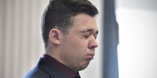 Kyle Rittenhouse cries as he is found not guilty on all counts on November 19, 2021, in Kenosha, Wisconsin, in the shooting of three demonstrators. 