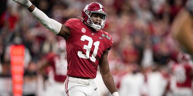 Linebacker Will Anderson Jr. of the Alabama Crimson Tide celebrates during their national title match against the Georgia Bulldogs on January 10, 2022 at Lucas Oil Stadium in Indianapolis, Indiana.