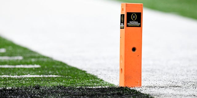 An end zone pylon displays the national championship logo during a game between the Alabama Crimson Tide and the Georgia Bulldogs in the college football national championship Jan. 10, 2022, at Lucas Oil Stadium in Indianapolis.