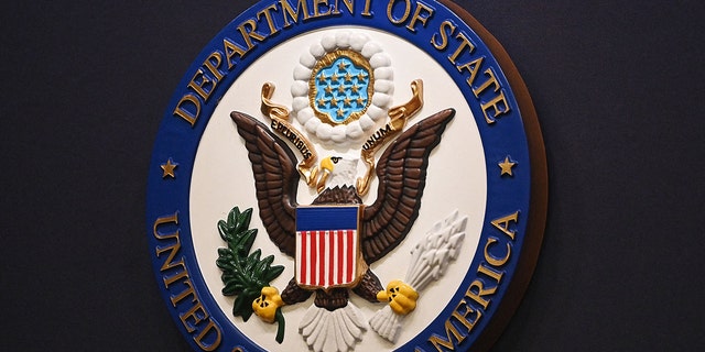 The State Department seal is seen on the briefing room lectern ahead of a briefing by State Department spokesperson Ned Price at the State Department in Washington, DC, on January 31, 2022. 