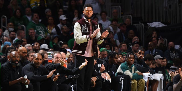 Ben Simmons, #10 of the Brooklyn Nets, cheers during Round 1 Game 1 of the 2022 NBA Playoffs on April 17, 2022 at the TD Garden in Boston.  