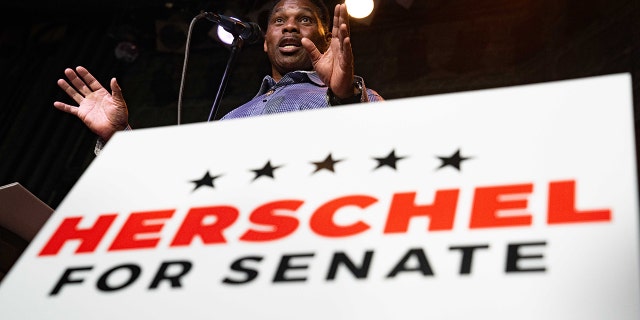 Heisman Trophy winner and Republican candidate for US Senate Herschel Walker speaks at a rally on May 23, 2022, in Athens, Georgia.