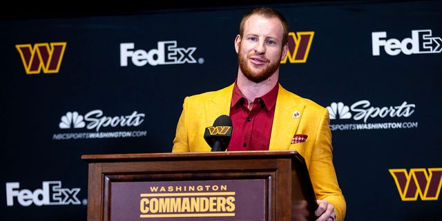 Quarterback Carson Wentz speaks at a press conference announcing his signing with the Washington Commanders at the Ashburn facility March 17, 2022. 