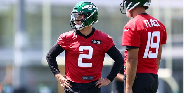 Quarterbacks Zach Wilson, #2, and Joe Flacco, #19 of the New York Jets, practice during New York Jets mandatory minicamp at Atlantic Health Jets Training Center on June 15, 2022 in Florham Park, New Jersey. 