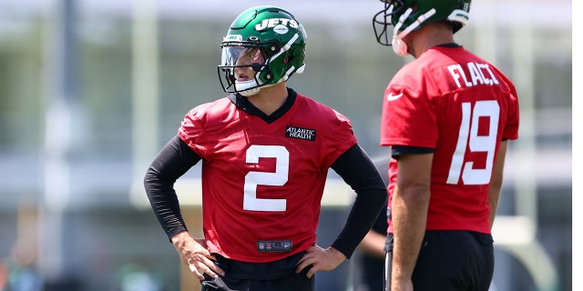 Quarterbacks Zach Wilson, #2, and Joe Flacco, #19 of the New York Jets, practice during New York Jets mandatory minicamp at Atlantic Health Jets Training Center on June 15, 2022 in Florham Park, New Jersey.