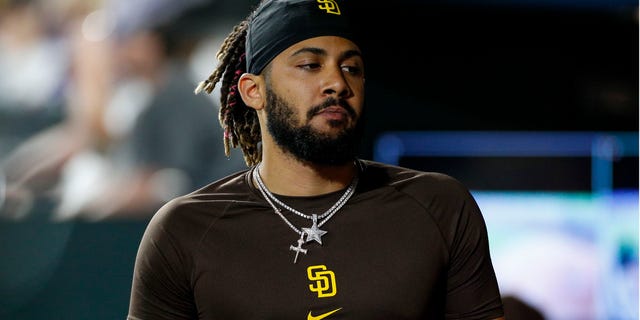 San Diego Padres shortstop Fernando Tatis Jr. (23) walks in the dugout during a regular season game between the San Diego Padres and Colorado Rockies on June 18, 2022, at Coors Field in Denver, CO. 