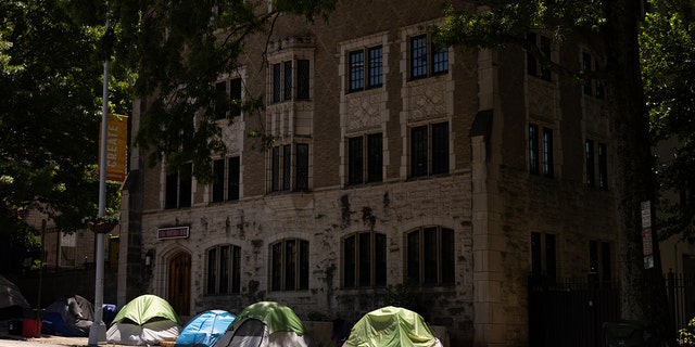 Tents belonging to people without housing during a heat advisory in Atlanta, Georgia, US, on Wednesday, June 22, 2022. 