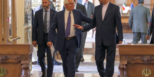 Iranian Foreign Minister Hossein Amir-Abdollahian, right, attends a press conference with Josep Borrell, the high representative of the European Union for Foreign Affairs and Security Policy, center, at the foreign ministry headquarters in Iran's capital, Tehran, on June 25, 2022.