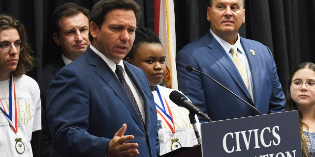 Florida Gov. Ron DeSantis speaks at a press conference to discuss Florida's civics education initiative of unbiased history teachings at Crooms Academy of Information Technology in Sanford.