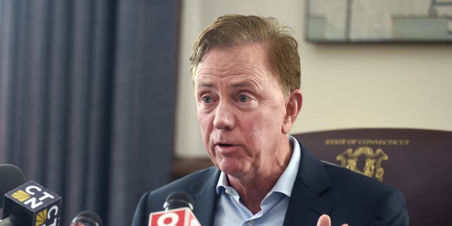 Connecticut Gov. Ned Lamont shown in this file photo in his Hartford office, has pledged to sign the abortion bill into law.