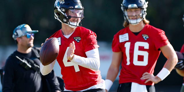 Jacksonville Jaguars quarterback Kyle Sloter (4) throws a pass during training camp July 28, 2022, at Episcopal School of Jacksonville in Jacksonville, Fla.