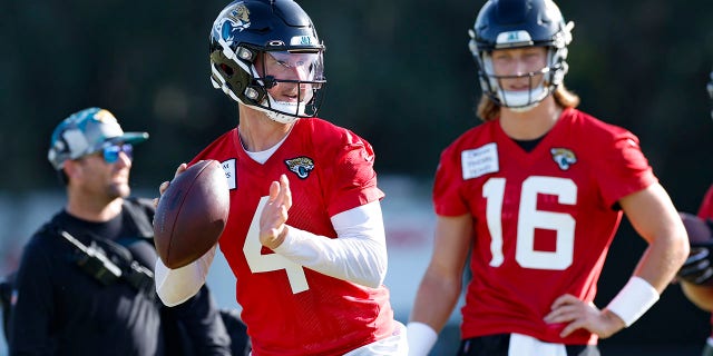 Jacksonville Jaguars quarterback Kyle Sloter (4) throws a pass during training camp July 28, 2022, at Episcopal School of Jacksonville in Jacksonville, Fla.
