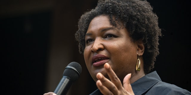 Georgia gubernatorial candidate Stacey Abrams speaks to supporters and members of the Rabun County Democrats group on July 28, 2022 in Clayton, Georgia. 