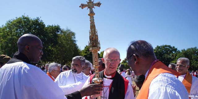 Archbishop of Canterbury Justin Welby (center right) with bishops from around the world gather at University of Kent in Canterbury for a group photo during the 15th Lambeth Conference on July 29, 2022.