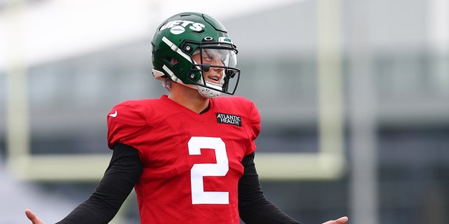 Quarterback Zach Wilson, #2 of the New York Jets, gestures during training camp at Atlantic Health Jets Training Center on August 1, 2022 in Florham Park, New Jersey. 