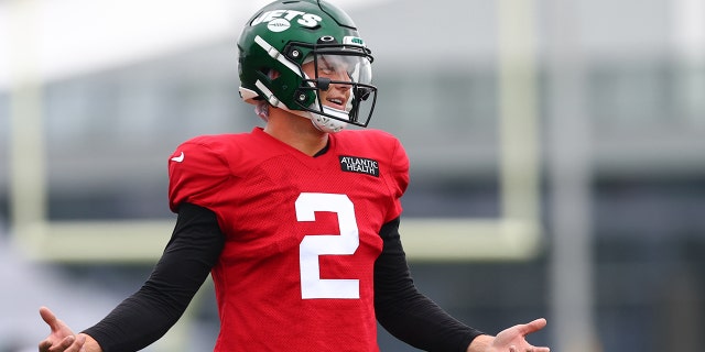 Quarterback Zach Wilson, #2 of the New York Jets, gestures during training camp at Atlantic Health Jets Training Center on August 1, 2022 in Florham Park, New Jersey.
