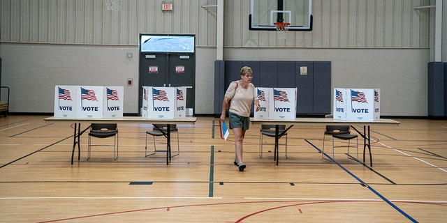 Voting at the Byron Township Community Center in Byron Township, Michigan, on Tuesday, August 2, 2022.