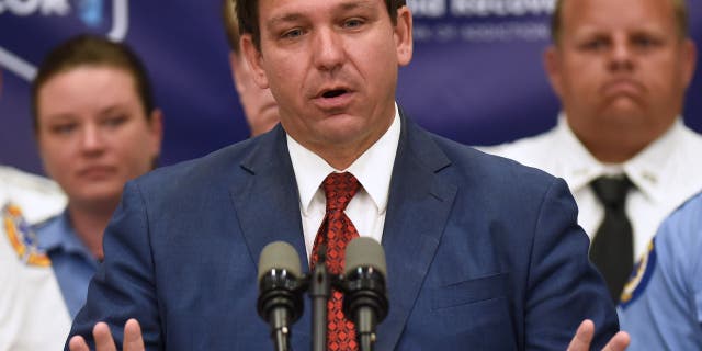 FILE: Florida Gov. Ron DeSantis speaks at a press conference to announce the expansion of a new, piloted substance abuse and recovery network to disrupt the opioid epidemic, at the Space Coast Health Foundation in Rockledge, Florida. 