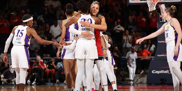 Elena Delle Donne #11 of the Washington Mystics and Nneka Ogwumike #30 of the Los Angeles Sparks on August 7, 2022 at the Entertainment & Sports Arena in Washington, DC. 