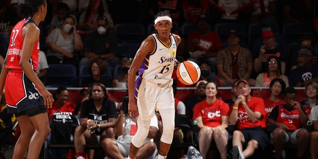 Brittney Sykes #15 of the Los Angeles Sparks dribbles the ball during the game against the Washington Mystics on Aug. 7, 2022 at Entertainment &amp; Sports Arena in Washington, DC. 