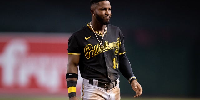 Pittsburgh Pirates Infielder Rodolfo Castro (14) after getting called out at first base during a Baseball game between the Pittsburgh Pirates and the Arizona Diamondbacks on August 9th, 2022, at Chase Field in Phoenix, AZ.