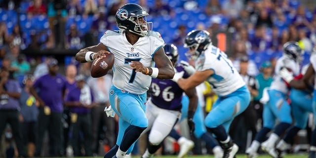 Tennessee Titans quarterback Malik Willis, #7, scrambles out the pocket to make a throw down field during an NFL preseason game between the Tennessee Titans and the Baltimore Ravens on August 11, 2022, at M&T Bank Stadium in Baltimore. 