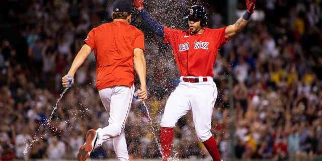 Tommy Pham, 22, of the Boston Red Sox scored a walk-off run in a 10-inning RBI win against the New York Yankees on Aug. 12, 2022 at Fenway Park in Boston.