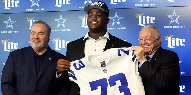 Dallas Cowboys first round draft pick Tyler Smith, center, is one of three rookies competing for starting jobs. 