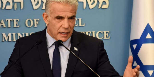 Israeli Prime Minister Yair Lapid speaks at a security briefing about Iran for the foreign press at the Prime Minister's office in Jerusalem on August 24, 2022.