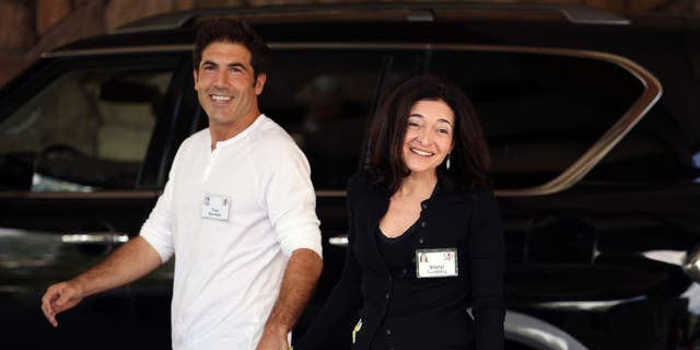 Facebook COO Sheryl Sandberg and Tom Bernthal arrive for the Allen & Company Sun Valley Conference on July 06, 2021, in Sun Valley, Idaho.