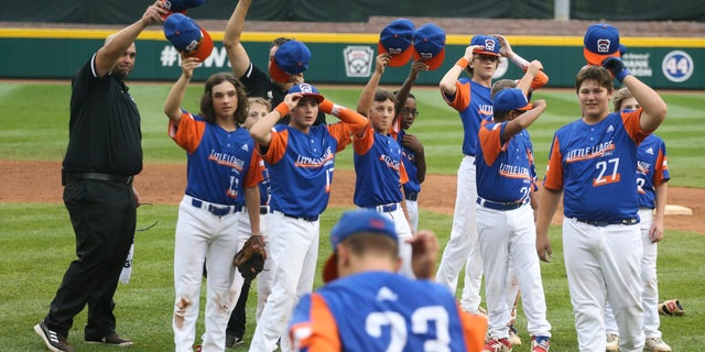 Team Michigan players celebrate winning the 2021 Little League World Series championship game against Team Ohio at Howard J. Lamade Stadium on August 29, 2021, in Williamsport, Pennsylvania.