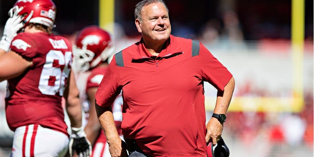 Head Coach Sam Pittman of the Arkansas Razorbacks talks with the officials during a game against the Auburn Tigers at Donald W. Reynolds Stadium on October 16, 2021 in Fayetteville, Arkansas. The Tigers defeated the Razorbacks 38-23.