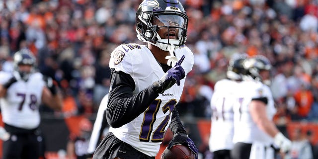 Rashod Bateman #12 of the Baltimore Ravens celebrates a touchdown during the first quarter in the game against the Cincinnati Bengals at Paul Brown Stadium on December 26, 2021 in Cincinnati, Ohio. 