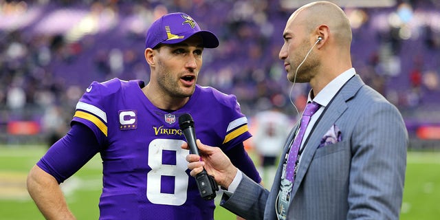 Minnesota Vikings quarterback Kirk Cousins ​​is interviewed by NFL sideline reporter Ben Lieber after a 31-17 win over the Chicago Bears at US Bank Stadium in Minneapolis, Minnesota on January 9, 2022 .