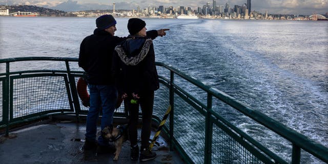 Washington ferry services are receiving $38 million in funding to improve their services. Pictured: People depart Seattle by ferry en route to Bainbridge Island on March 8, 2022.