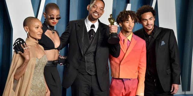 Will Smith, seen after winning the Oscar for Best Actor and after he slapped Chris Rock. He is pictured with his wife Jada and three children: Willow, Jayden, and Trey (from left to right).