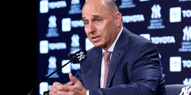 New York Yankees General Manager Brian Cashman speaks to the media prior to the start of the game against the Boston Red Sox at Yankee Stadium on April 8, 2022, in New York City.