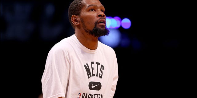 Kevin Durant of the Brooklyn Nets warms up before game four of the Eastern Conference playoffs against the Boston Celtics at Barclays Center on April 25, 2022.