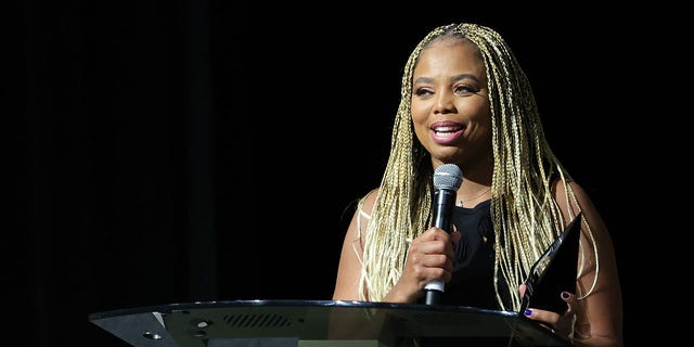 Jemele Hill accepts the William C. Rhoden Sports Media Award at the Advancement of Blacks in Sports (ABIS) Champions and Legends Awards on May 28, 2022, in Las Vegas.