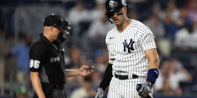 Joey Gallo #13 of the New York Yankees reacts after striking out during the eighth inning of the game against the Oakland Athletics at Yankee Stadium on June 28, 2022 in New York City.